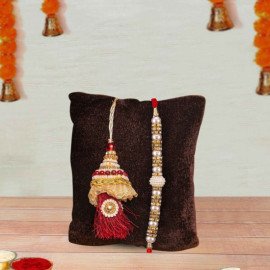Amazing Lumba Rakhi with Cute Ganesha Idol