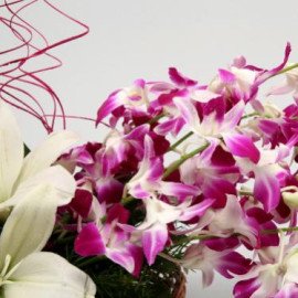 Beautiful Lilies And Orchids Basket Arrangement