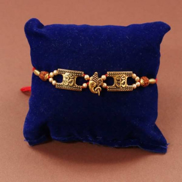 OM Rakhi Tied With Pearl Thread and Rudraksha