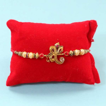 Lord Ganesh Rakhi Tied With Designer Beads