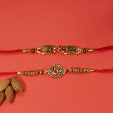 set of 2 metal om rakhi