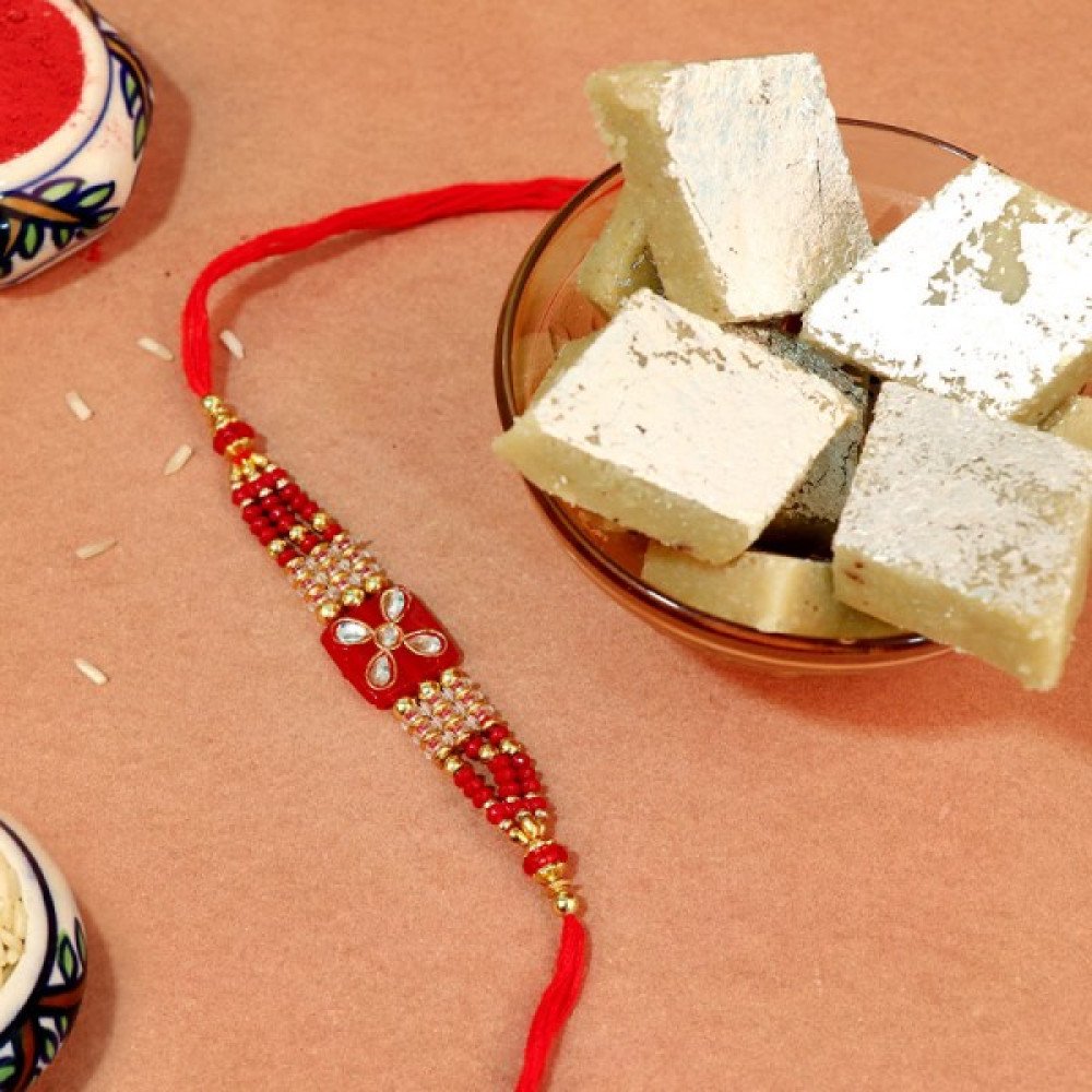 Gliterring Red Kundan Rakhi With Delicacy