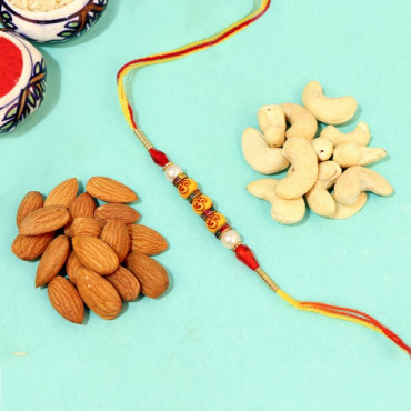Spiritual Om Pearl Rakhi with Dry Nuts