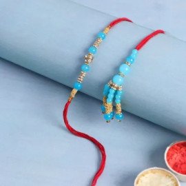 Bhaiya Bhabhi Rakhi With Happy Rakhi Poster Cake (Half kg)