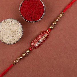 Capsule Rakhi and Assorted Floral Green Tea Hamper
