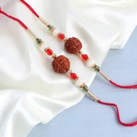 Rudraksh Rakhi Set Of 2 With Pineapple Cake (Half kg)